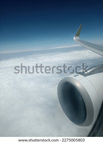 As the plane flew over the clouds, the picture was taken from Bangladesh