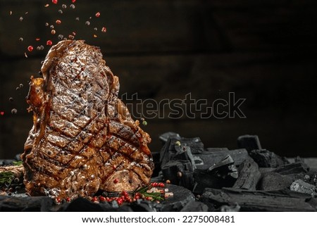 T-bone or porterhouse beef meat Steak for steakhouse menu. banner, menu, recipe place for text. Royalty-Free Stock Photo #2275008481