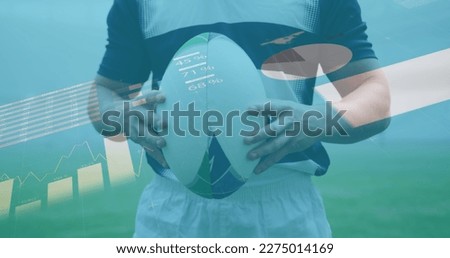 Image of statistics over rugby player. global sports, technology, digital interface and connections concept digitally generated image.