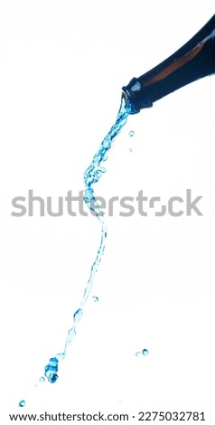 Drinking Water in Plastic Bottle fall fly in mid air, fresh water glass bottle floating explosion. Fresh water bottles pour throw in air. White background isolated freeze motion high speed