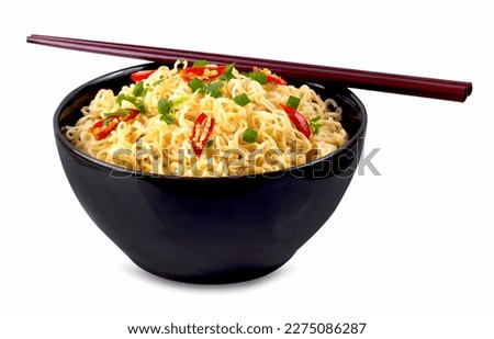 Cooked instant noodles with vegetables in black bowl isolated on white background with clipping path. Asian and Chinese style fast food concept. Royalty-Free Stock Photo #2275086287