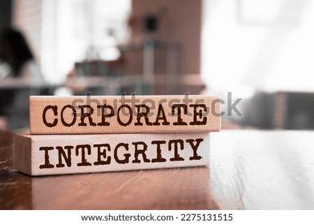 Wooden blocks with words 'Corporate integrity'.