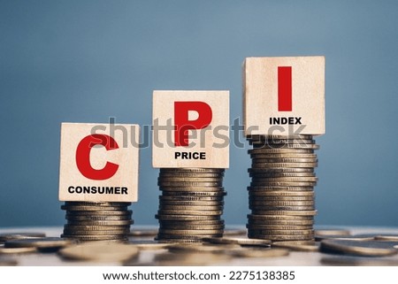 CPI, consumer price index symbol.Wooden block with words CPI, consumer price index on dollar bills. Business and CPI, consumer price index concept. Royalty-Free Stock Photo #2275138385