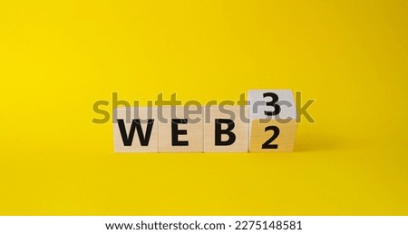 Web 3 vs Web 2 symbol. Turned wooden cubes with words web 2 vs web 3. Beautiful yellow background. Business concept. Copy space