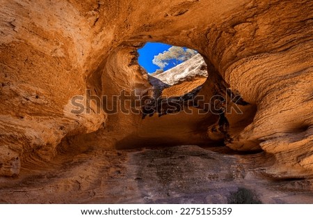 Mountain cave with orange stone texture