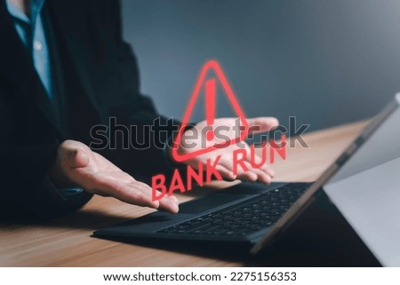 Businessman fail from bank run Phenomenon. Fall of financing, startups, Stock, Financial, Bitcoin , Cryptocurrency, bankruptcy, failure, defeat, banking, loss, money concept. Royalty-Free Stock Photo #2275156353