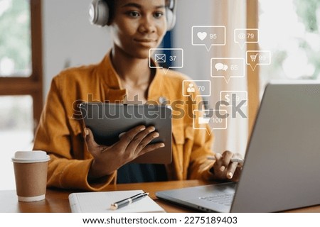 Social media and Marketing virtual icons screen concept. close up of businesswoman typing keyboard tablet with laptop computer  and smart phone

