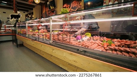 Chops of beef meat on skewers layout in the store. Selection of different cuts of fresh meat raw red in a supermarket. Royalty-Free Stock Photo #2275267861