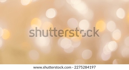 Abstract bokeh background beige colored, natural flare from lights, beige monochromatic photo with optical effect, blurred round bokeh texture as holiday banner, celebration wallpaper, neutral color