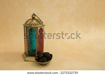 Traditional Lantern and Dates near to it, Ramadan and Eid concept Selective focus