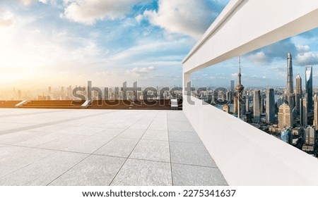 Look at the Shanghai urban square and skyline through the window