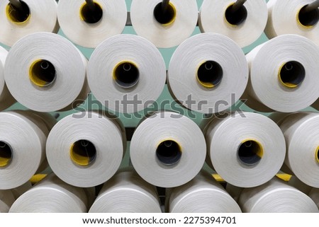 cotton yarn in manufacturing process Royalty-Free Stock Photo #2275394701