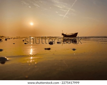 Boat anchored on the seashore 