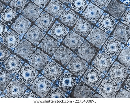 Old Sicilian style ceramic tiles on the floor of a monastery in Palermo, Sicily, Italy