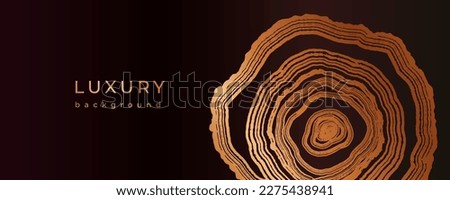 Luxury golden background with wood annual rings texture. Banner with shiny tree ring pattern. Stamp of tree trunk in section. Natural wooden concentric circles. Black and bronze gold background Royalty-Free Stock Photo #2275438941