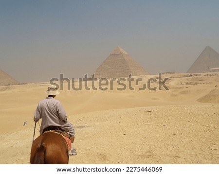 This picture is taken while horse riding around pyramids of giza