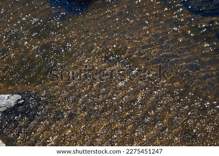 texture of water in a river with waves