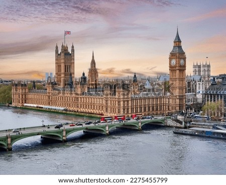 London cityscape with Houses of Parliament and Big Ben tower at sunset, UK Royalty-Free Stock Photo #2275455799