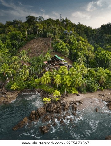 Nuqui choco jungle forest rock ocean beach colombian pacific coast pristine natural lanscape aerial nature palm trees and mountains Royalty-Free Stock Photo #2275479567