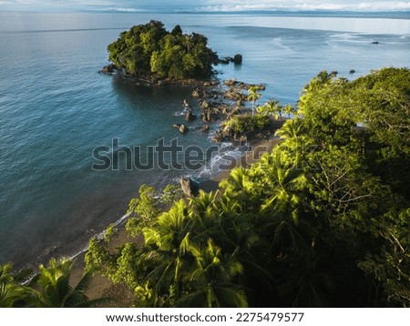Nuqui choco jungle forest rock ocean beach colombian pacific coast pristine natural lanscape aerial nature palm trees and mountains Royalty-Free Stock Photo #2275479577