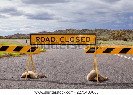 Australia road closed yellow sign