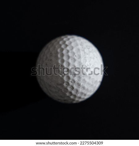 Golf ball moon like black and white