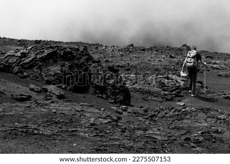 Hiking walk in volcano landscape look like mars moon black and white
