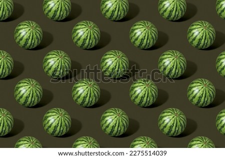 Pattern of watermelon on green pastel background