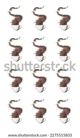 pattern made of splash of coffee beans from a white cup isolated over white background. High quality photo
