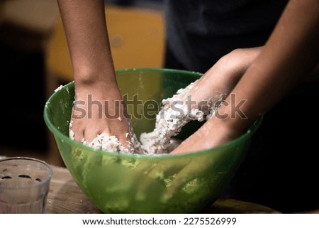 kids cooking flour hands food