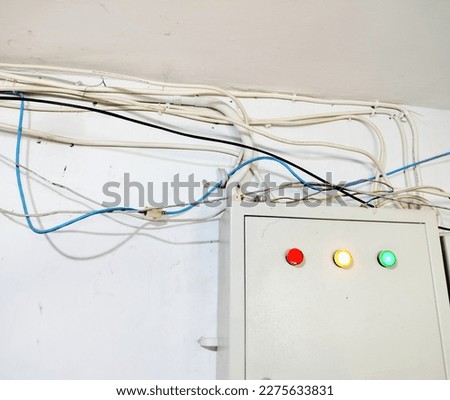 electrical panels with messy wires