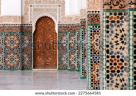 Beautiful typical moroccan tiles in the Madrasa - Marocco Royalty-Free Stock Photo #2275664581