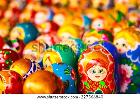 Colorful Russian Nesting Dolls Matreshka At The Market. Matrioshka Babushka Nesting Dolls Are The Most Popular Souvenirs From Russia. Toned instant photo