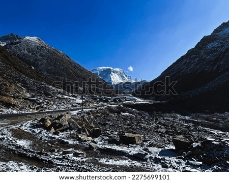 The famous flat-headed glacier mountain is north of Sikkim, India near Guru Dongmar Lake.