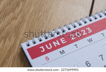 Closeup shot of a 2023 calendar, "June page". Selective focus shot of a calendar, focused on "June, 2023". Royalty-Free Stock Photo #2275699901