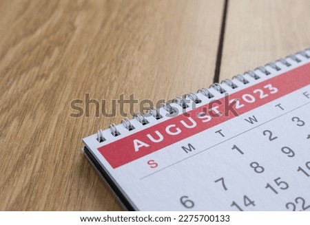 Closeup shot of a 2023 calendar, "August page". Selective focus shot of a calendar, focused on "August, 2023".