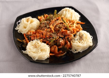 whelk noodles vegetable hot food Royalty-Free Stock Photo #2275740787