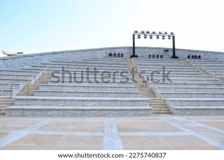 Empty stadium stairs and lights ,concrete steps outdoor