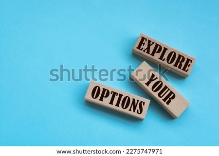 Explore Your Options - words from wooden blocks with letters, Business concept