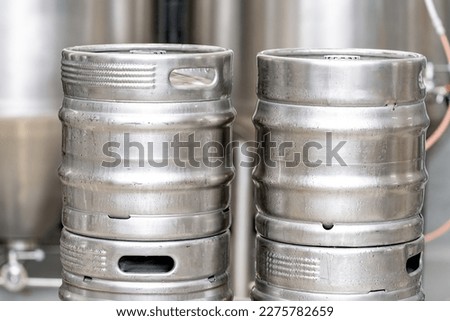 stainless steel beer barrel in the brewery Royalty-Free Stock Photo #2275782659