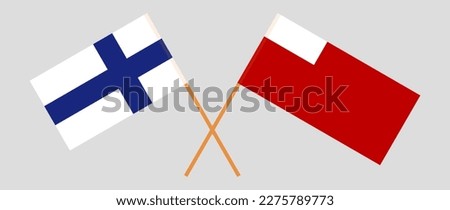 Crossed flags of Finland and Abu Dhabi. Official colors. Correct proportion. Vector illustration