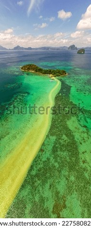 aerial vertical panoramic photography of snake island in the archipelago el Nido, Philippines with some tourist's boats