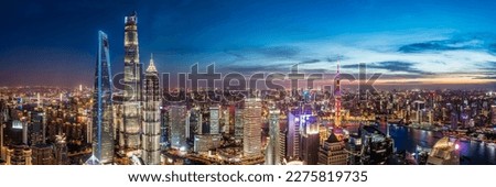 Aerial view of Shanghai skyline and modern buildings at night, China. Panoramic view.