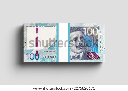 bundle of 100 peruvian soles bills, peruvian currency on white background in high resolution Royalty-Free Stock Photo #2275820171
