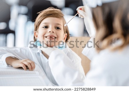 Little boy getting a nasal swab