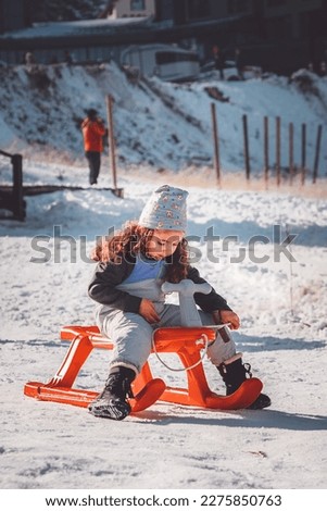 Sledding at Uludag Mountain with a child