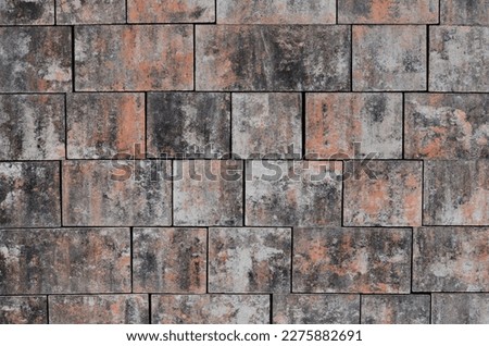 cement concrete pavement with irregular spots of gray color. two sizes of tiles per square. cheap texture regard lolmo down from the drone, brown, sabdstone, brick