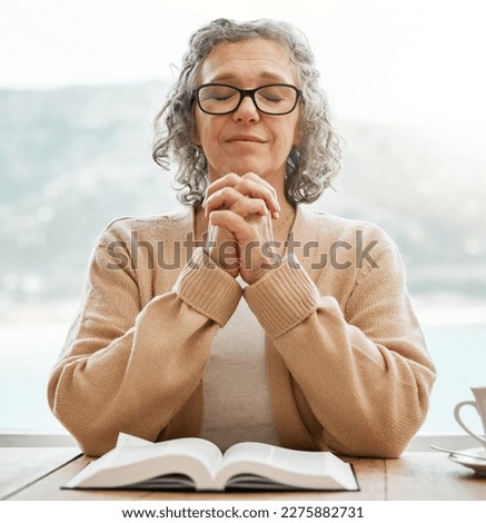 Bible, praying or senior woman in prayer reading book for holy worship, support or hope in Christianity or faith. Relax, meditation or elderly person studying or learning God in spiritual religion Royalty-Free Stock Photo #2275882731