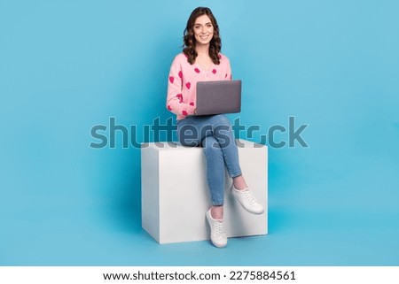 Full length photo of sweet busy lady dressed pink cardigan working modern device isolated blue color background
