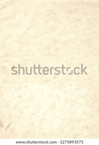 Hand craft nepal paper texture background. Homemade brown patchy blank page with pieces of grass, newspapers, fibers, secondary raw materials, waste processing. Royalty-Free Stock Photo #2275893573